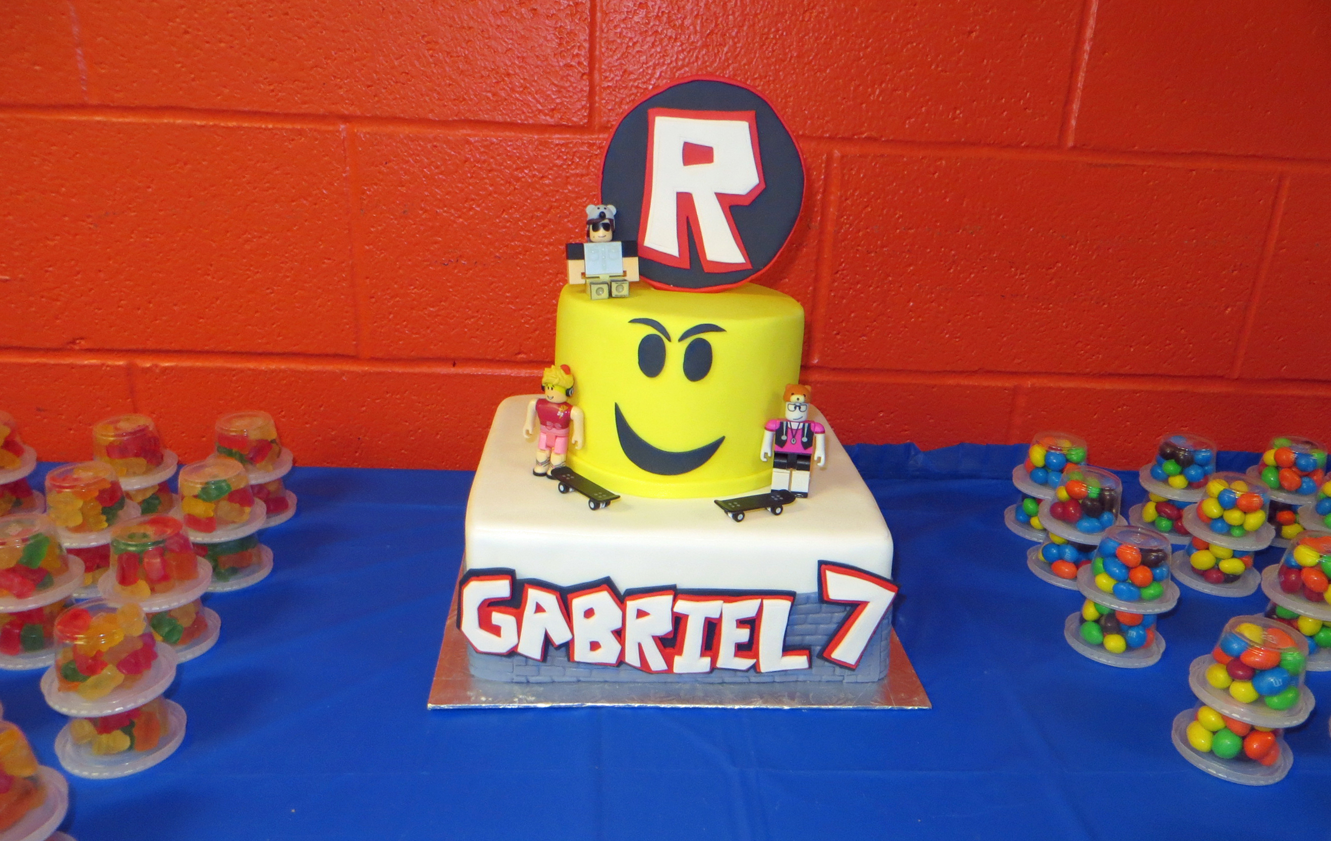 Fondant covered birthday cake decorated like Lego.