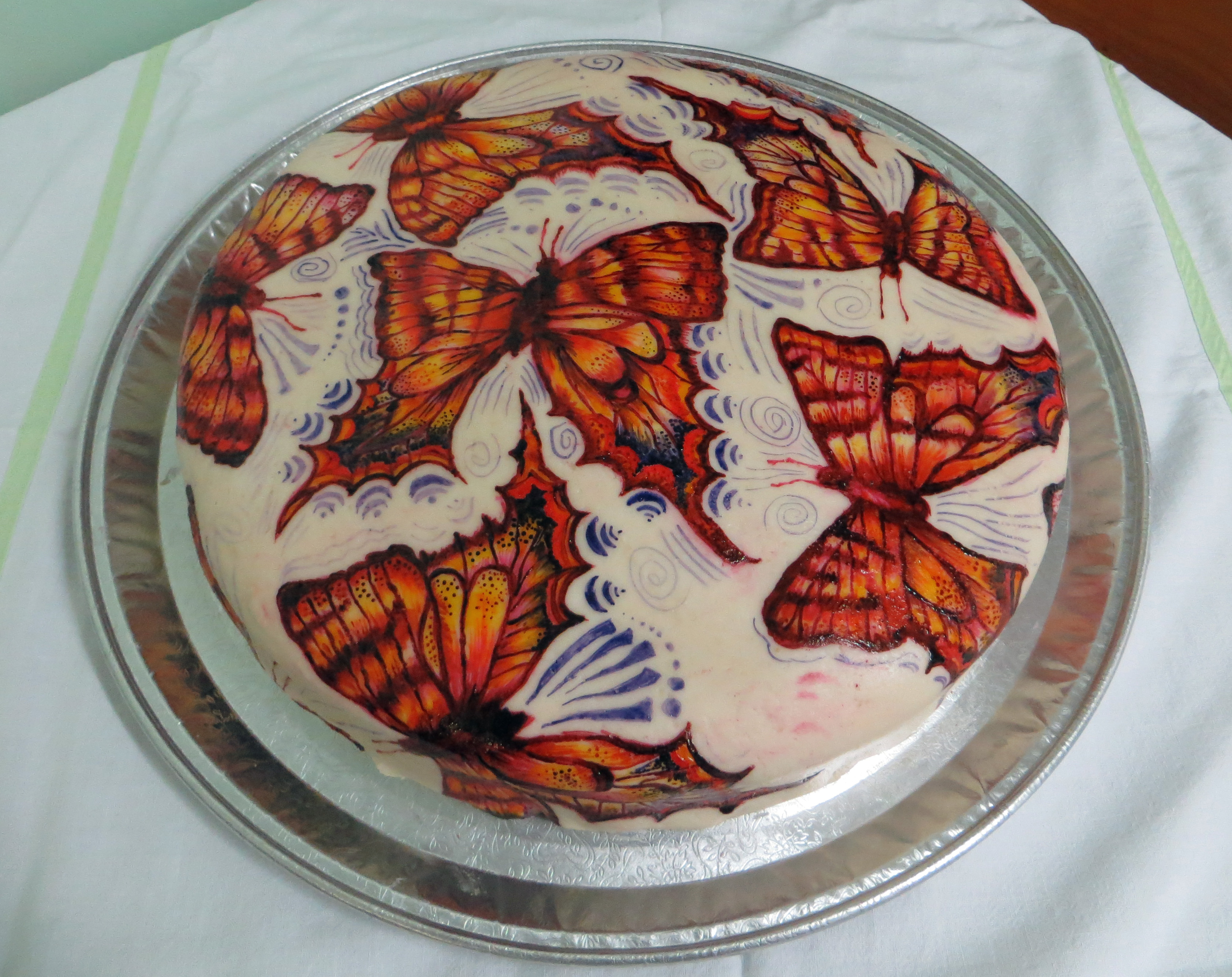 Elaborate swallowtail style butterflies painted with food colouring.