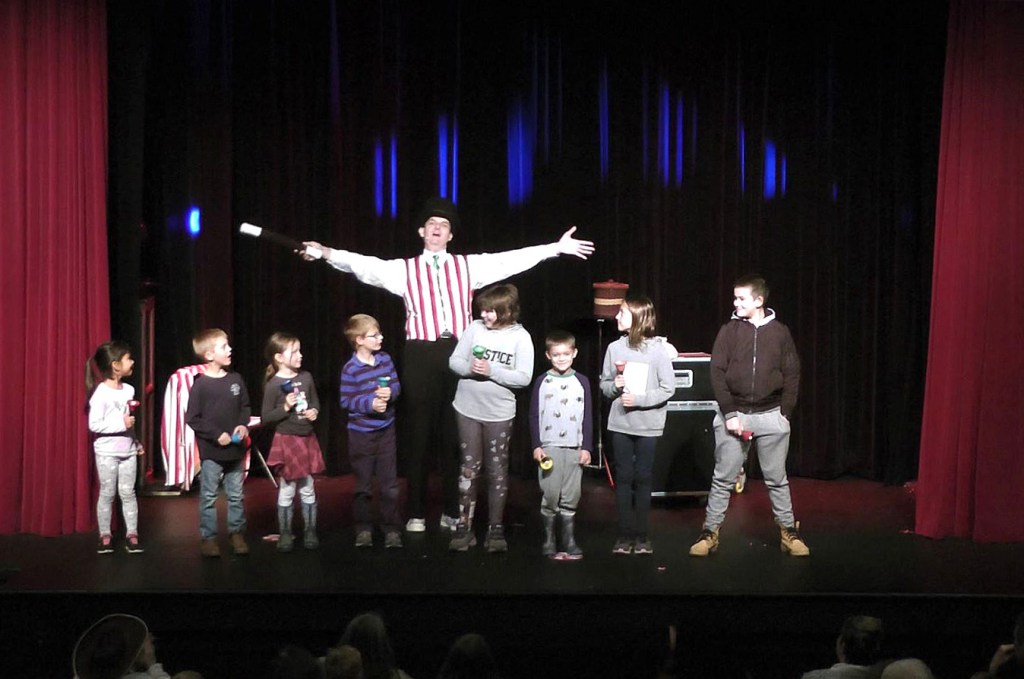 Owen with 8 kids on same stage during routine.