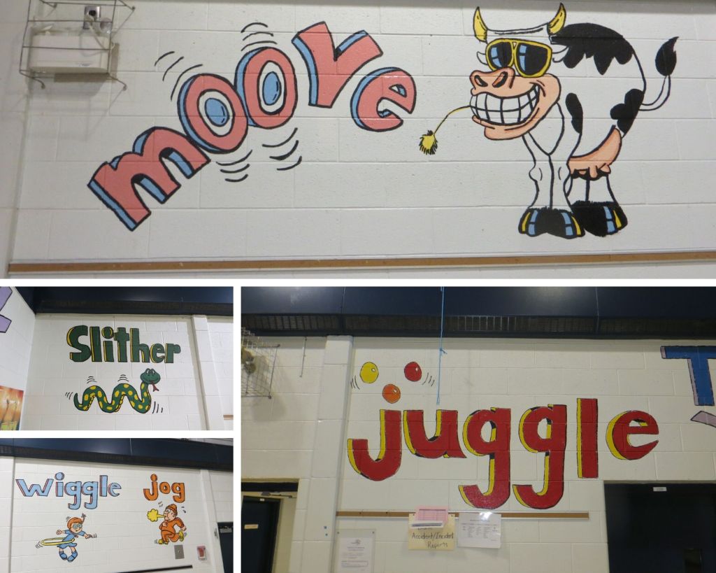 Animal theme motivational slogans on school gym walls.