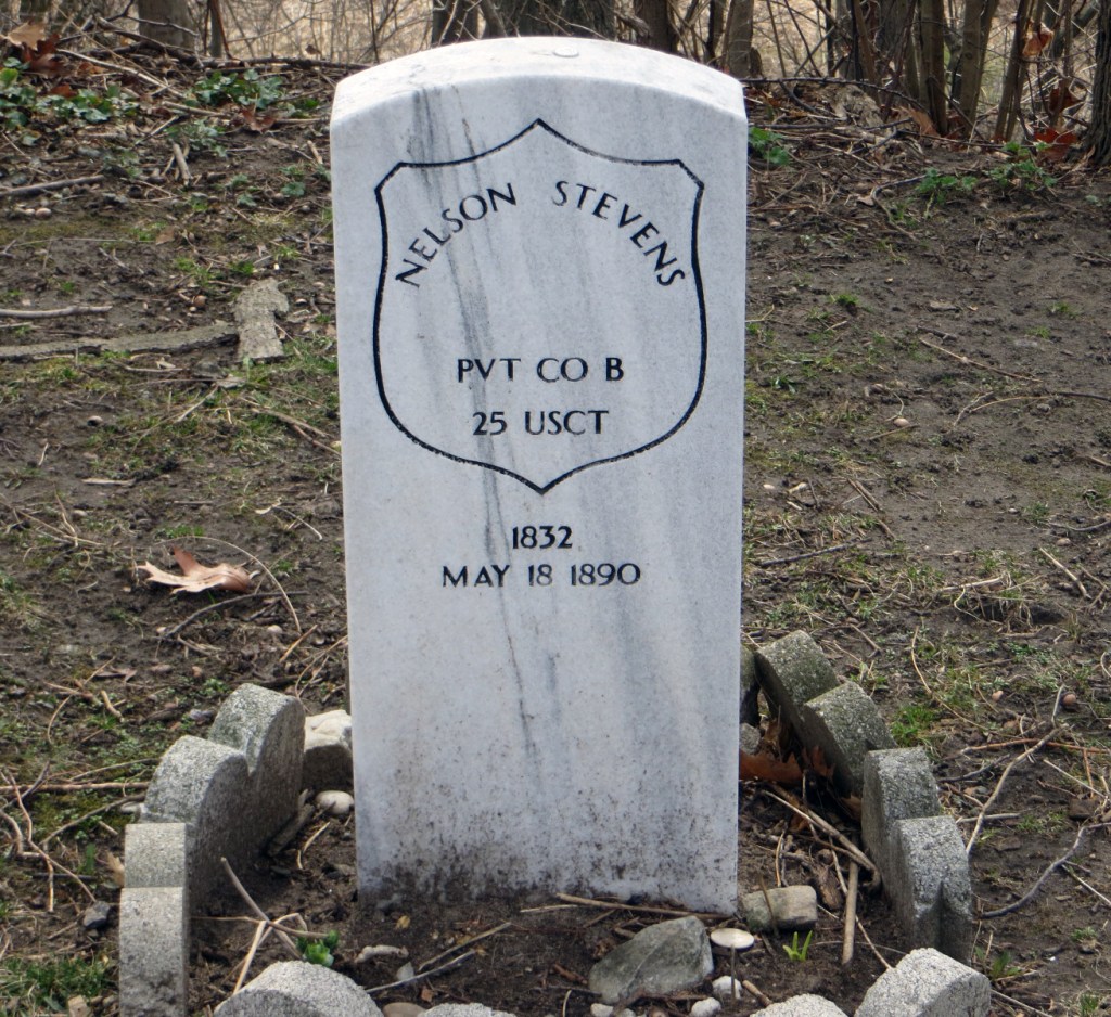 Military style upright marble grave stone of Nelson Stevens.
