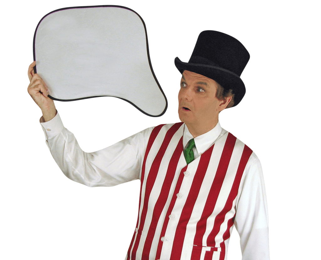 promo photo: Owen with a quizzical look staring to his right at a thought bubble style blank sign for client to add copy on to.