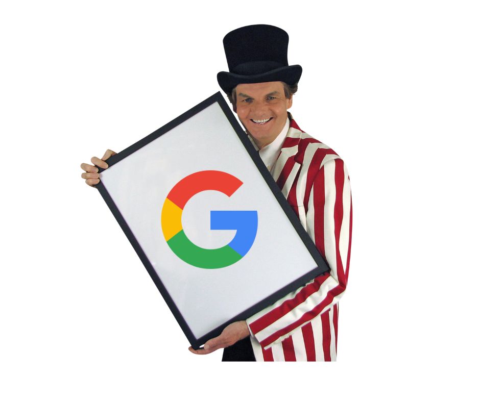 Owen holding a signboard with the Google logo photo shopped on to it.