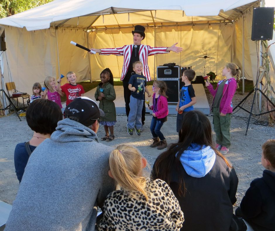 Owen performing at the 2017 Caledonia Fair assisted by some kids.