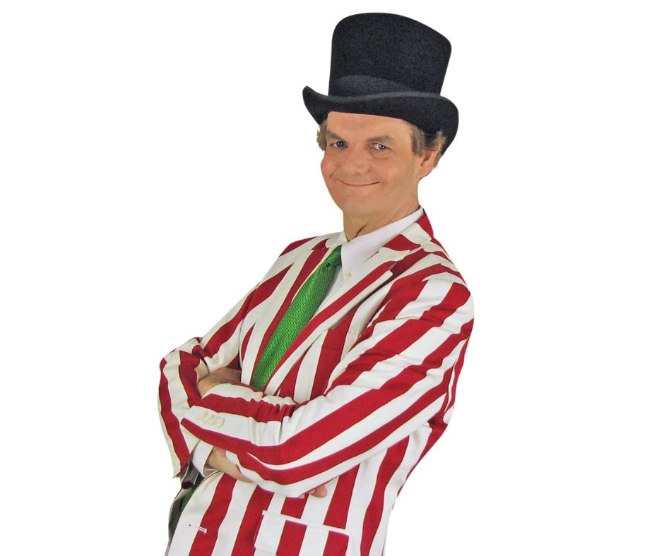 Magician Owen in his top hat and red & white striped costume.