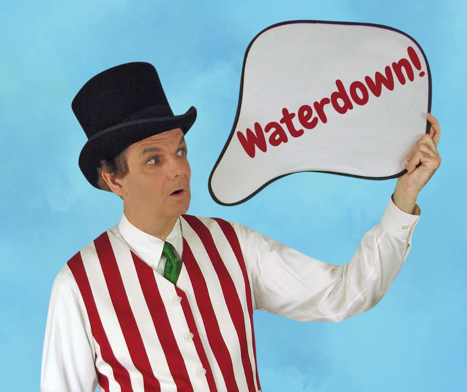 Magician Owen holding a thought bubble style sign that reads Waterdown.