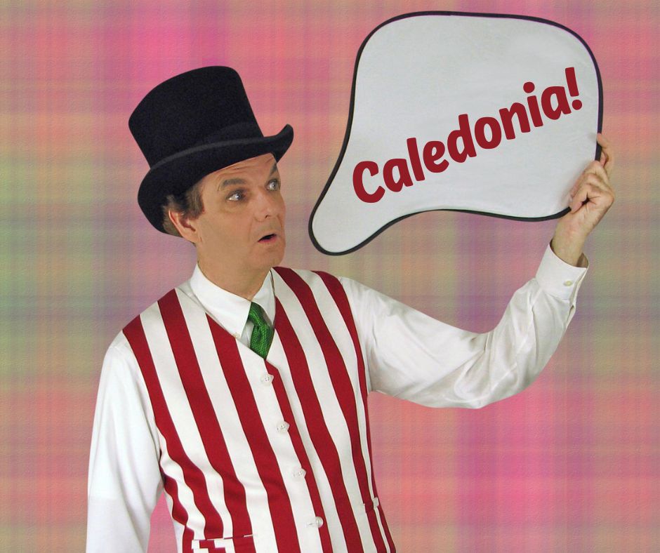 Magician Owen looking at thought bubble that reads Caledonia.