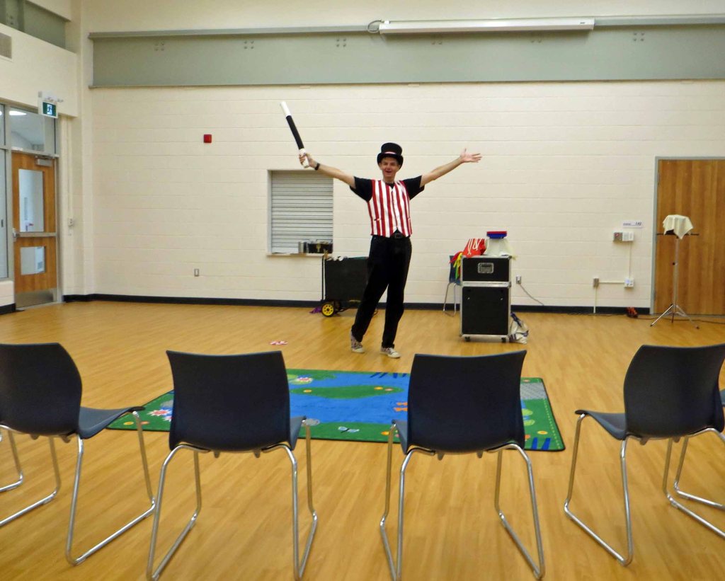 Owen the Magician in program room of Greensville branch library shortly before the show starts.